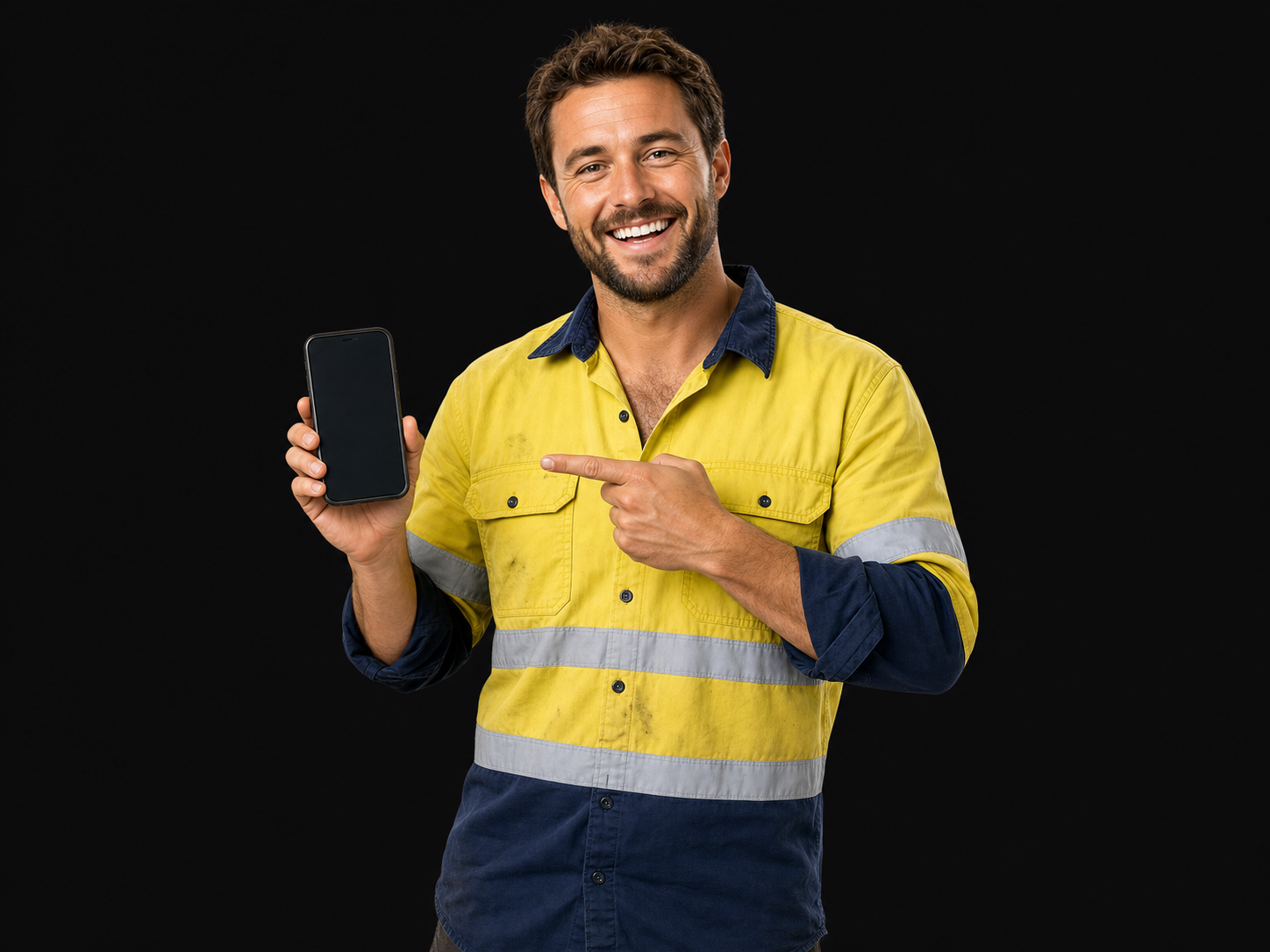 Happy tradesman holding a phone and pointing to it after a finance approval
